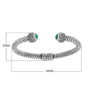Sterling silver Balinese cuff bangle with round green quartz and rope-style band