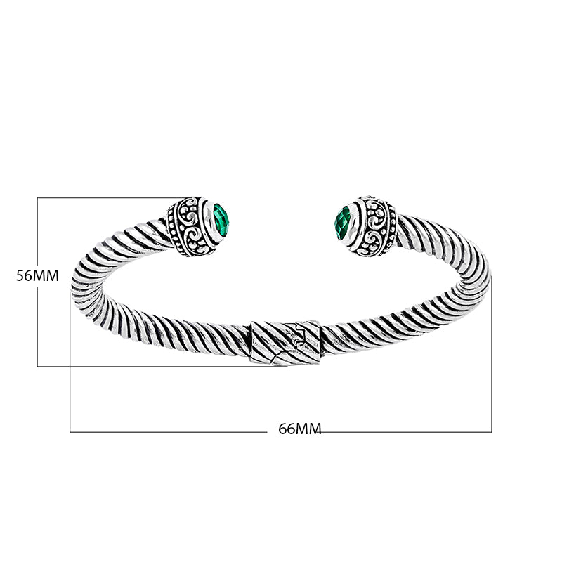 Sterling silver Balinese cuff bangle with round green quartz and rope-style band