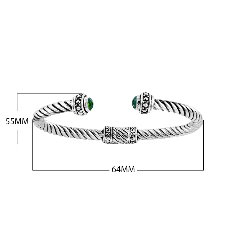Sterling silver twisted rope bangle with Green Quartz ends, handcrafted in Bali.