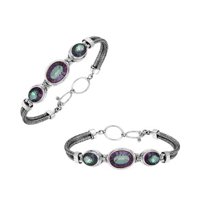 Sterling silver bracelet with three mystic quartz stones and woven Bali chain.