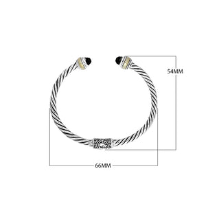 Wholesale Black Onyx bangle in 925 sterling silver with twisted rope design, brass accents, and oxidized finish, handcrafted in Bali.