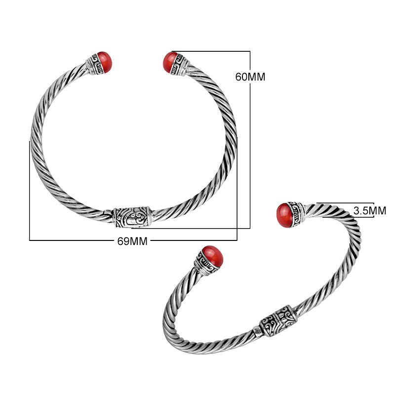 Wholesale sterling silver Red Coral bangle with twisted rope design, Balinese motifs, and oxidized finish, handcrafted in Bali.