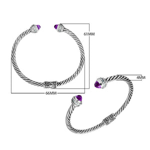 Sterling silver wholesale bangle with twisted rope design, Black Onyx and Cubic Zirconia accents, handcrafted Balinese motifs.