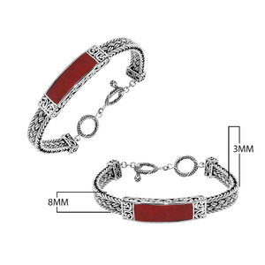 Sterling silver bracelet with Coral inlay and toggle lock handcrafted in Bali.