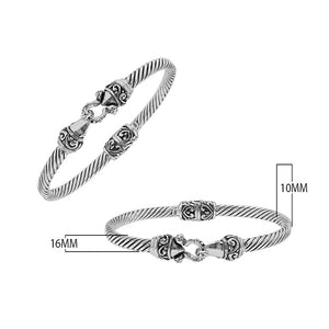 Sterling silver twisted bangle with Balinese detailing and hook clasp handcrafted in Bali.