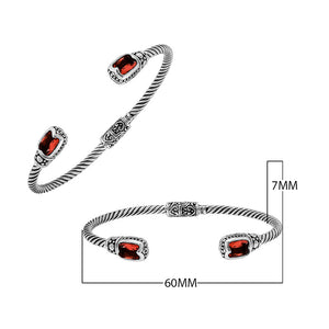 Silver twisted cable bangle in 925 sterling silver with Garnet Quartz ends and Balinese engraving.