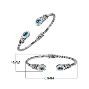 925 sterling silver cable bangle with Blue Topaz Quartz stones and hand-engraved Balinese detailing.