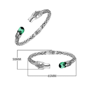 Sterling Silver Dragon Head Bangle with Green Quartz handcrafted in Bali featuring ornate filigree design and oxidized silver finish.