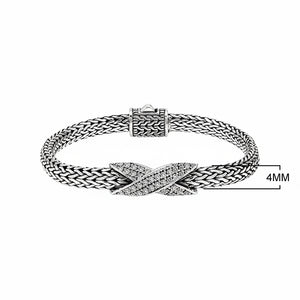 Sterling silver woven chain bracelet with White Cubic Zirconia crossover accent handcrafted in Bali.