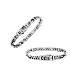 Sterling Silver chain bracelet featuring a polished surface and a secure push clasp decorated with tribal pattern detailing, crafted for durable everyday wear and elegant appeal.