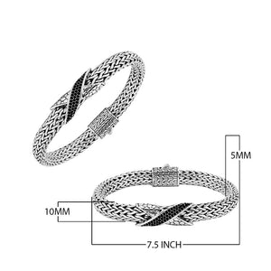 Sterling Silver woven bracelet featuring a polished push clasp and a Cubic Zirconia accented centerpiece, crafted with intricate detailing for durable and visually refined wholesale presentation.