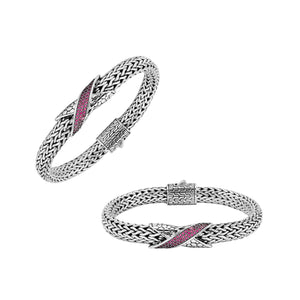 Sterling Silver woven chain bracelet featuring a polished push clasp and a Ruby Quartz crisscross accent centerpiece crafted with detailed metalwork for an elegant and durable wholesale presentation.