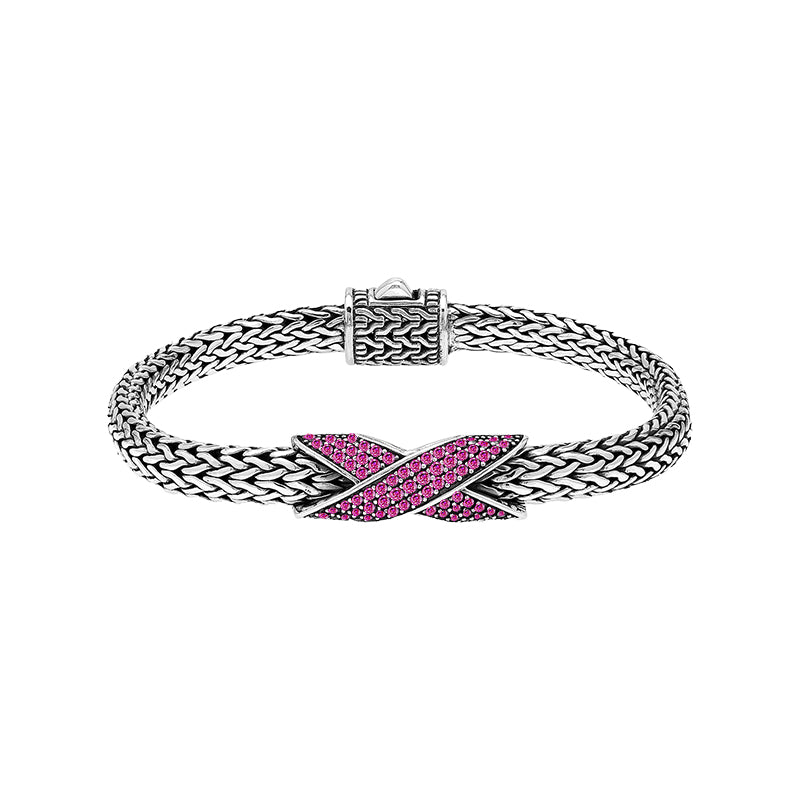 Sterling silver woven chain bracelet with purple Ruby Quartz crossover accent handcrafted in Bali.