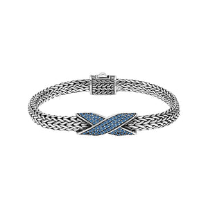 Sterling silver woven chain bracelet with purple Sapphire quartz crossover accent handcrafted in Bali.