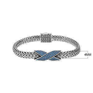 Sterling silver woven chain bracelet with purple Sapphire quartz crossover accent handcrafted in Bali.