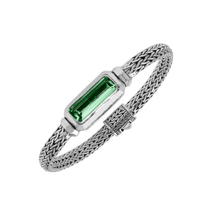Wholesale sterling silver bracelet with rectangular green quartz baguette and woven chain handcrafted in Bali.