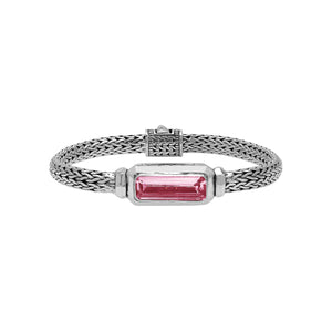 Wholesale sterling silver bracelet featuring a rectangular pink quartz baguette with a handwoven silver chain handcrafted in Bali.