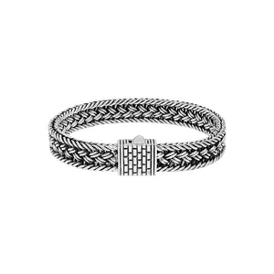 Sterling silver braided chain bracelet with textured clasp handcrafted in Bali.