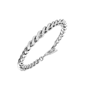 Sterling Silver curb chain bracelet featuring a smooth toggle lock and polished high-gloss surface, crafted to provide durable structure for premium wholesale presentation.
