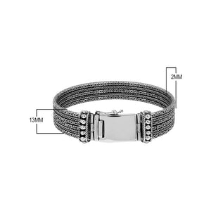 Sterling silver multi-chain panel bracelet with polished finish and handcrafted silver detailing.