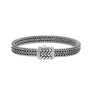 Sterling silver flat multi-strand woven braided chain bracelet featuring tightly interlaced silver links, oxidized detailing, and a decorative geometric push clasp, displayed from two angles.