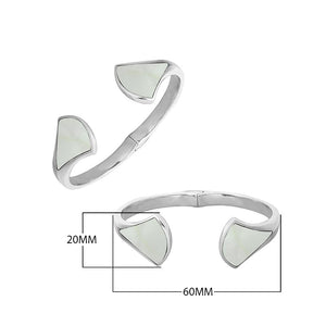 Wholesale sterling silver cuff featuring smooth Mother Of Pearl inlays placed on sculpted open ends with a polished finish and secure hinge lock for catalog display.