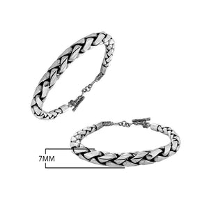 Wholesale sterling silver bracelet featuring a thick 7MM round braided chain with polished detailing, oxidized highlights, and a secure toggle lock for catalog-ready presentation.