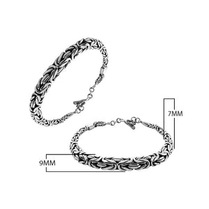 Wholesale sterling silver bracelet featuring a bold 7MM x 9MM braided chain with polished and oxidized details and a secure toggle lock for catalog-ready presentation.