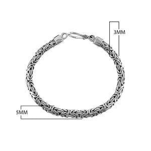 Wholesale sterling silver bracelet featuring a 3MM x 5MM Balinese woven chain with polished and oxidized detailing, finished with a secure lobster lock for catalog presentation.