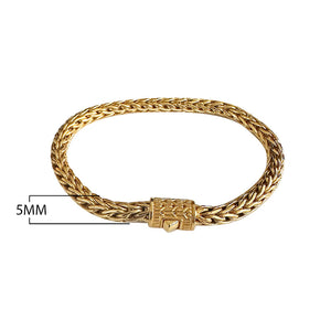 Wholesale 18K gold bracelet featuring a polished 5MM woven Balinese chain with intricate braiding and a secure push clasp ideal for luxury catalog placement.