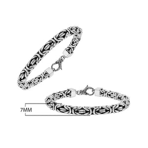 Wholesale sterling silver bracelet featuring a bold 7MM Balinese woven chain with oxidized accents and a secure lobster lock designed for premium bulk catalogs.