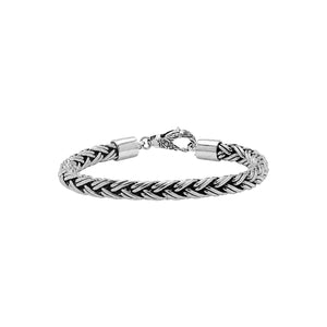Sterling silver thick braided wheat chain bracelet with oxidized finish and hook clasp handcrafted in Bali.