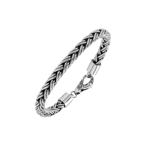 Sterling silver thick braided wheat chain bracelet with oxidized finish and hook clasp handcrafted in Bali.