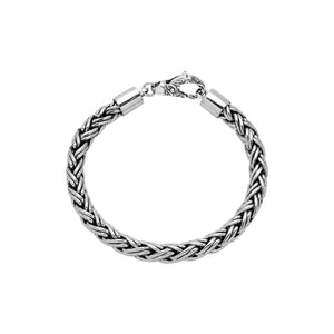 Sterling silver thick braided wheat chain bracelet with oxidized finish and hook clasp handcrafted in Bali.