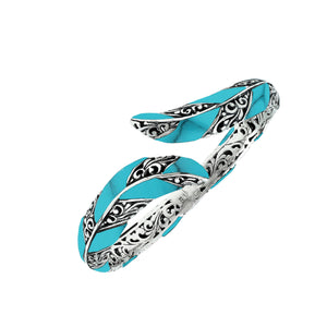 Wholesale sterling silver feather-style bangle featuring Turquoise Shell inlays, ornate Balinese scroll engravings, and a secure hinge lock for premium artisan jewelry assortments.