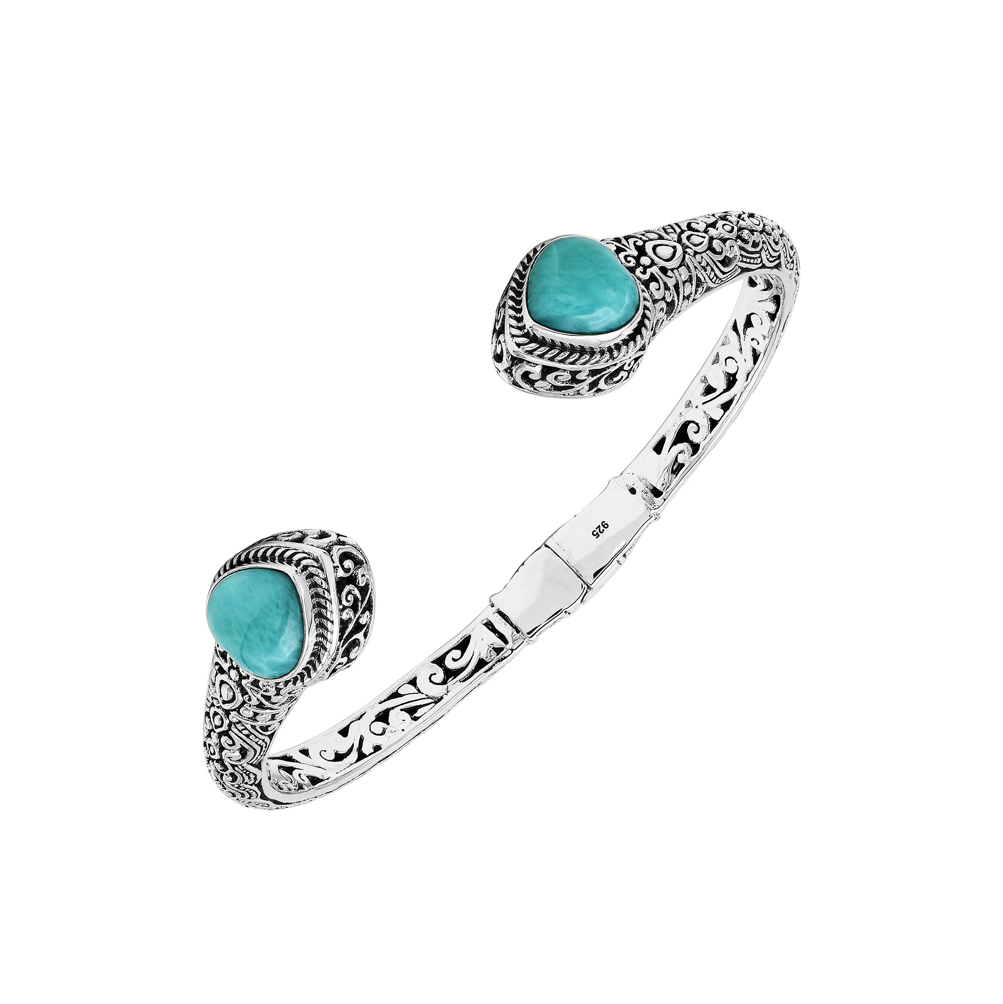 Wholesale sterling silver bangle featuring Larimar double-end stones, ornate Balinese scroll engravings, and a secure hinge lock for artisan-quality jewelry collections.