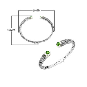 Wholesale sterling silver Bali engraved hinge cuff bracelet featuring vivid peridot quartz stones with polished–oxidized detailing, thoughtfully crafted for refined and artistic wholesale jewelry selection needs.