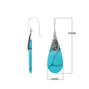 Turquoise Shell teardrop silver earrings with swirl pattern