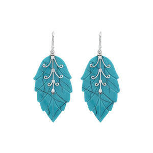 Sterling silver turquoise shell carved leaf drop earrings with polished silver detailing and handcrafted stone design.