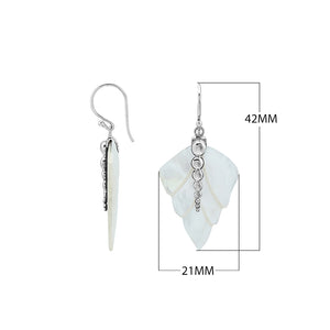 Sterling silver mother of pearl carved leaf drop earrings with polished silver bead detailing and handcrafted shell design.