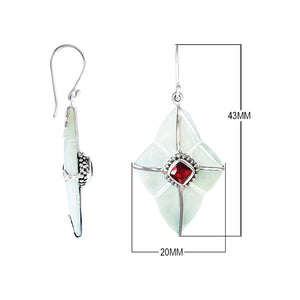 Sterling silver Mother Of Pearl and Garnet Quartz dangle earrings with geometric inlay panels, faceted red centers, and radiating silver accents