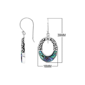 Sterling silver oval drop earrings featuring iridescent Abalone Shell inlay, openwork centers, sculpted scroll detailing, oxidized accents, and classic French ear wires.