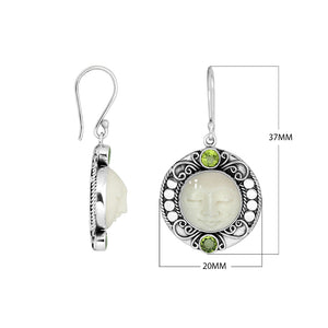 Wholesale sterling silver earrings with carved bone face and Peridot Quartz accents.