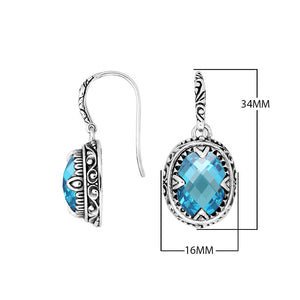 Sterling silver oval drop earrings with Blue Topaz Quartz and ornate oxidized silver detailing for wholesale collections.