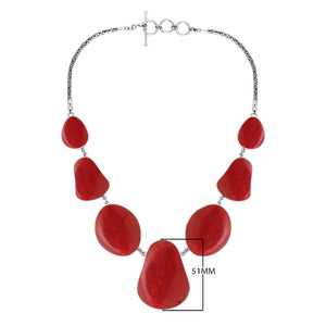 Wholesale sterling silver teardrop coral necklace with Balinese handcrafted design.