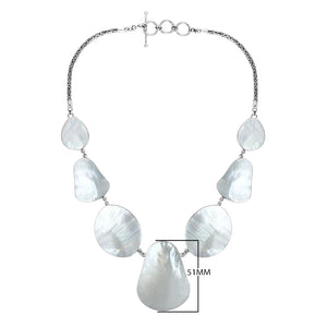 Wholesale sterling silver Mother of Pearl teardrop necklace with Balinese handcrafted design.
