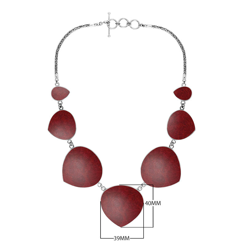 Wholesale sterling silver heart-shape coral necklace with Balinese handcrafted design.