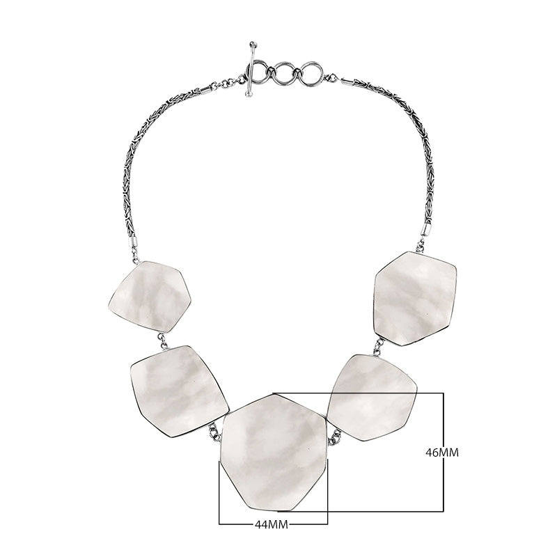 Sterling silver necklace with hexagon-shaped mother of pearl links, polished artisan finish.