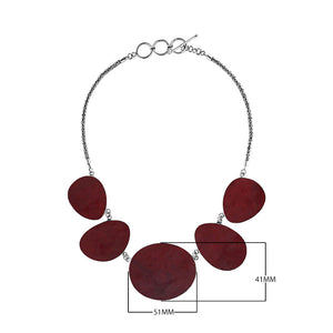 Sterling silver necklace with oval red coral links, polished artisan finish.