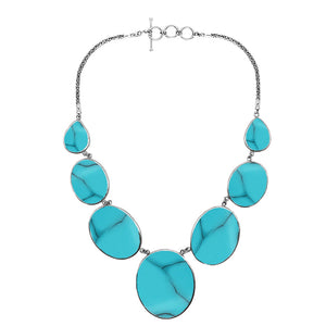 Wholesale turquoise shell necklace in 925 sterling silver with oval and teardrop shell panels, handcrafted in Bali